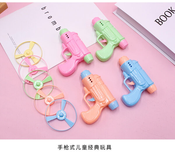 Creative gyro gun, UFO gun, gyro ground gun, pistol, bamboo dragonfly, flying wheel toy, frisbee, vibrato hit -1pcs (Any Color)